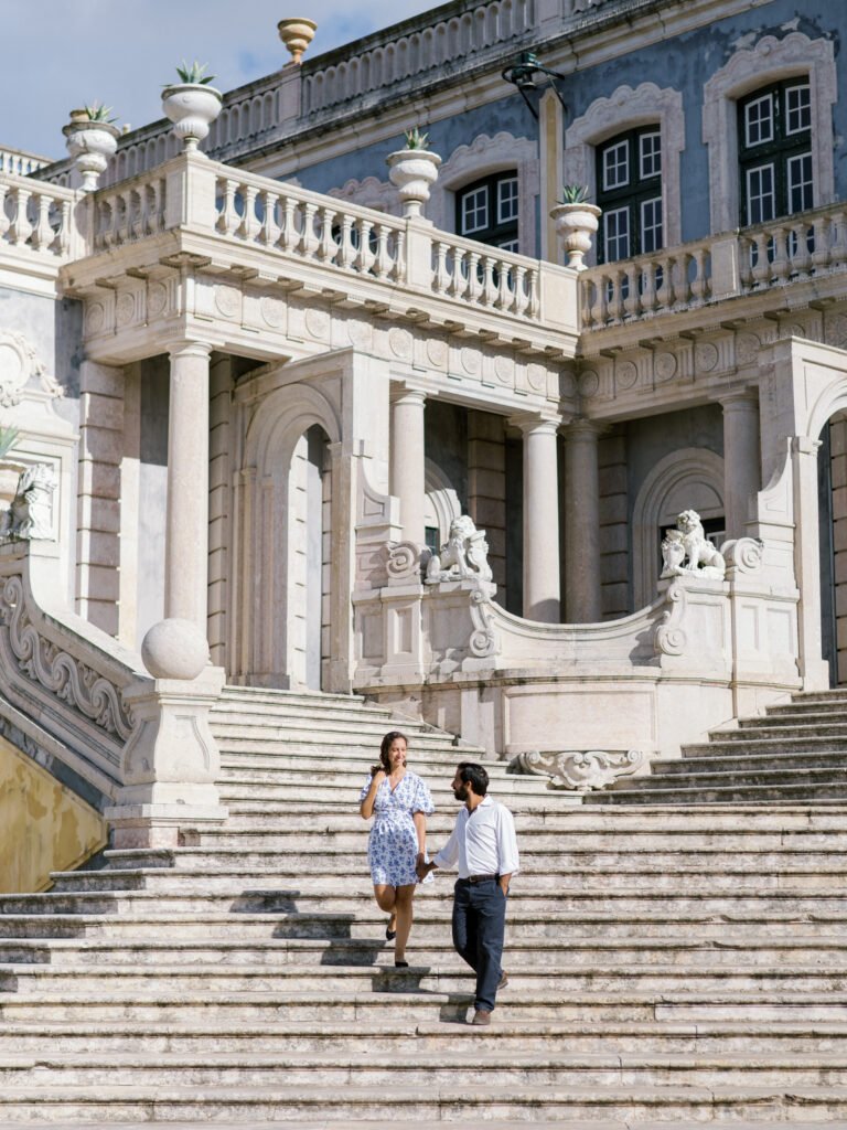 Engagement photoshoot with a couple on the stairs of Palácio Nacional de Queluz, by Lisbon wedding photographer, Miguel Rosenstok